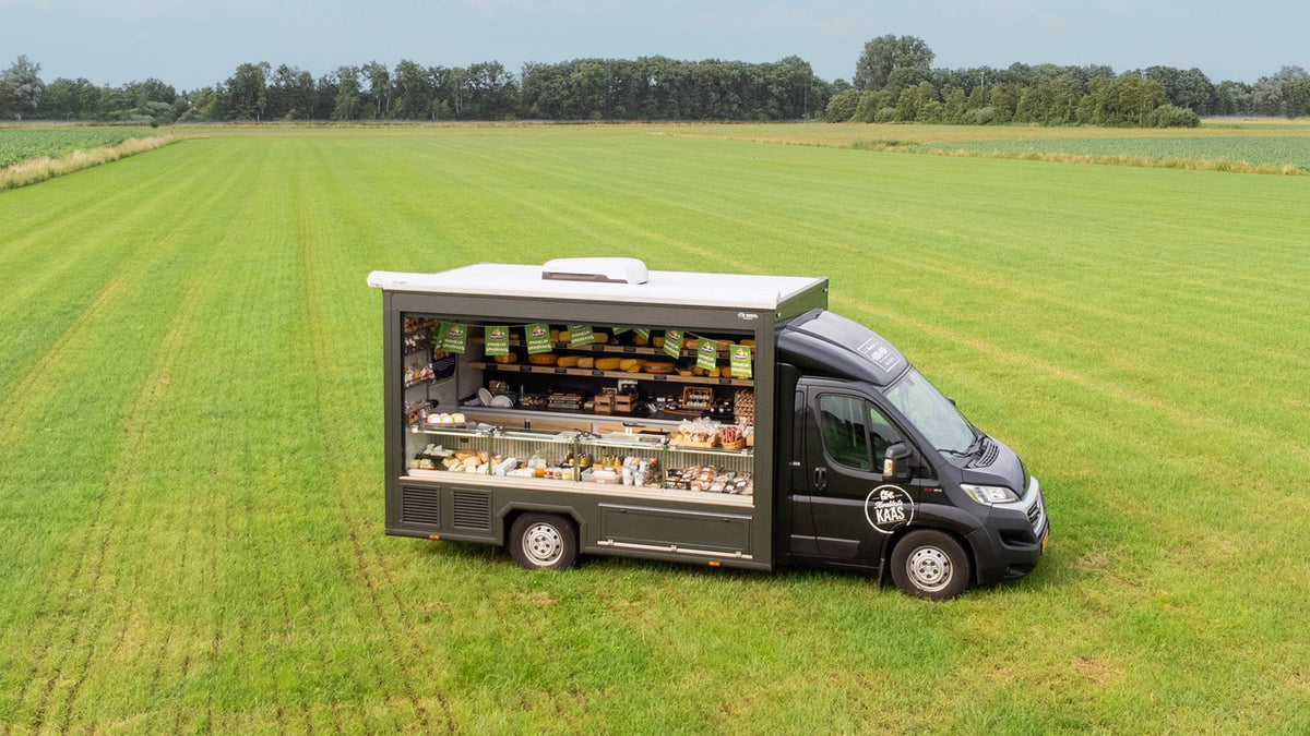 Kaasauto van Cheese @Home in het weiland