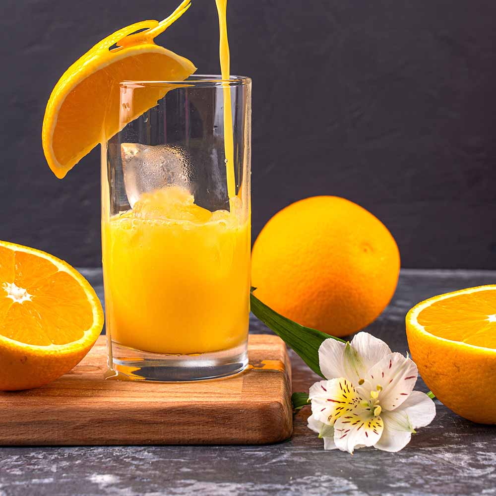 Glas jus d'orange met sinaasappels | Kaas & Borrelz