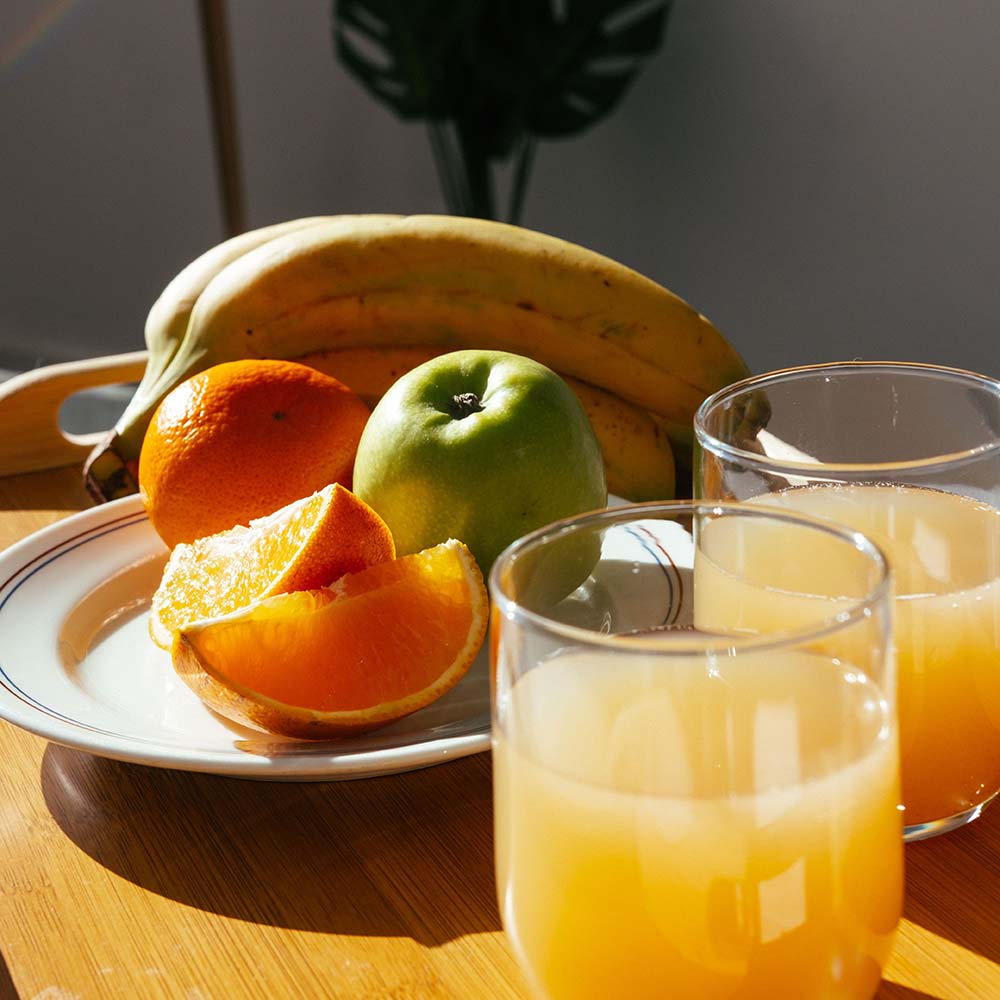 Fles Appel-Sinaasappelsap 750ml sfeerbeeld | Kaas & Borrelz