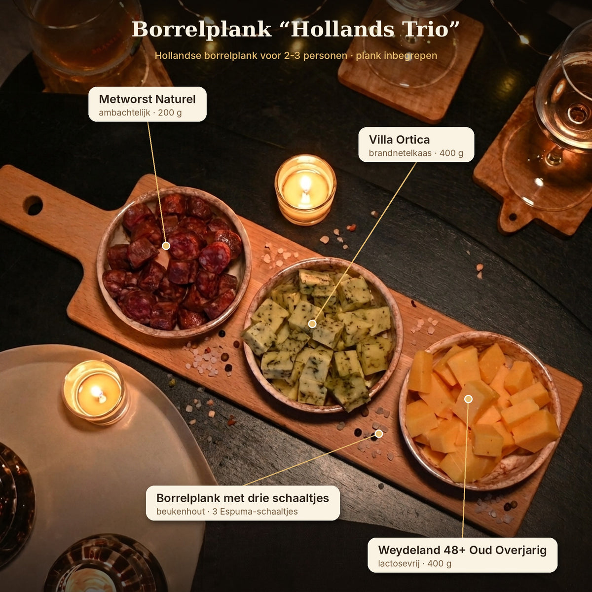 Inhoud borrelplank Hollands Trio: Weydeland Overjarig, Villa Ortica brandnetelkaas en metworst op een plank met drie schaaltjes | Kaas & Borrelz